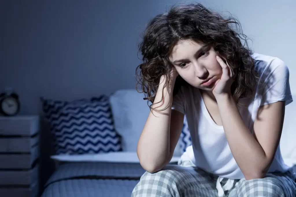 Girl Sitting Alone Sleep Deprivation