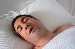 Man Snoring In Bed Head Shot